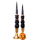 Elevate your Halloween décor with an enchanting touch with this exquisite 2-piece unscented cat-shaped taper candle set. Each candle, elegantly topped with a whimsical witch hat, is meticulously crafted from high-quality paraffin wax and coated in a deep, mysterious black. Their charmingly spooky design will capture the imagination and delight all who behold them. Boasting an impressive estimated burn time of 7 hours, these captivating candles create a bewitching ambiance.

Paraffin Wax