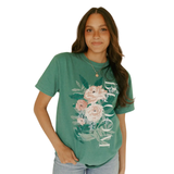 You're going to love our whimsy + colorful tee. Hand-drawn pinky/ peach and blue florals take center stage, enriched in playful monochromatic colors with the word "BLOOM" is written along the side in white.

Comfort Color Unisex Tee 100% Cotton