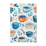 These towels are perfect home and kitchen decor, and also makes a great hostess gift for your next tea party! Blue and orange teacups, teapots and botanical leaves are scattered all over this beautiful white towel.

Measures approximately 16”x 24”

Made of 80% Polyester and 20% Polyamide.

Design is permanently printed - Single side across whole towel

It is called a waffle weave because the towel has raised looped edges on the surface of the towel in the shape like that on a delicious Belgian Waffle. These