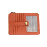 We love this mini wallet in bonfire orange vegan leather! It is full of style and will hold your license and up to six credit cards. The zipper pocket is roomy enough for change and cash, and it has a back pocket.&nbsp; This mini wallet is perfect for you and makes an awesome gift!

DIMENSIONS: 4 IN. H X 5.5 IN. W X .25 IN. D

ZIPPERED TOP CLOSURE ON EDGE

6 CREDIT CARD POCKETS

ID WINDOW POCKET

EXTERIOR PASSPORT POCKET

STRIPED LINING

BRASS PLATED HARDWARE

100% VEGAN LEATHER (POLYURETHANE)