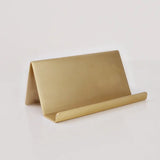 Display your Truth for Today cards in style. This satin brass card holder comfortably holds all 31 cards and makes it easy to flip through the cards. Set out on a table, desk, bookshelf, or window sill.

Details: - 3.5" x 2.25" x 1.75" - satin brass