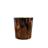 This beautiful small marbled bronze candle holder has etched leaves scattered all around it. A beautiful piece to stick in with your fall decor, it easily fits a small candle or a votive and will create a gorgeous glow in your home!

Candle not included

Glass

Approximately 3" H x 2.5" Dia&nbsp;