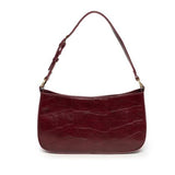 The sleek burgundy Erin Hobo will compliment your look for the office or your next night out. Fashioned in glossy croc embossed vegan leather, this sophisticated bag closes with a brass zipper to keep your belongings secure and is accented with burnished brass rings that open to allow you to change the shoulder straps. Two shoulder straps are included with this stylish Hobo, a short strap to carry close to the body or a long strap to carry as a shoulder bag or as a crossbody. Both straps are adjustable and 