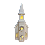 This sweet ceramic church is decorated for the holiday with a wreath above the center window. That window, the two windows on either side, the steeple opening and then the two large windows on each side of the church light up with a LED bulb making it glow for the winter season! There is an on and off switch to turn the light on. There is no timer switch on this holiday church.

approximately 2.75" W x 6.75" H

Ceramic