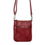 This chili colored compact phone bag is designed for everyday convenience and hands-free style. This slim crossbody is made from softly tumbled vegan leather with a sleek silhouette, adjustable crossbody strap and a secure zip closure. The Lia features a front zip pocket and a back slide pocket to keep your phone, cards, keys and small essentials neatly organized and easy to access. This crossbody bag is perfect for travel, shopping, concerts or daily errands.
Product Details
Dimensions: 7.5 in. H x 6.25 in