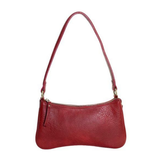 Meet Nicolette, our sleek, curvy chilli colored crossbody pochette with a minimalist style. Featuring soft sculptural curves in tumbled vegan leather, this bag is closed with a brass zipper that encloses 3 interior compartments to keep your cards, cash, keys and phone stowed neatly. The gleaming brass rings open to swap out the two included shoulder straps. A short strap for dressier looks and a longer adjustable crossbody strap when you want to go hands free. Available in an array of beautiful colors, the 