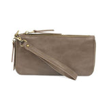 Cool, stylish, and organized, too! This Mushroom wallet has it all! 12 credit card pockets, 2 change pockets and 2 billfold pockets all wrapped in lush tumbled vegan leather, lined with rugged washed canvas, and accented with our new Logo zipper pull. The removable strap lets you carry it as a compact wristlet, too!


Dimensions: 7.75 in. W x 4 in. H x .5 in. D
Full Zip Around Closure
Exterior Zip Pocket on Spine
Removable Wristlet Strap
12 Credit Card Pockets
2 Billfold Pockets
Interior Zipper
Coin Pocket
