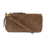 Cool, stylish, and organized, too! This cocoa wallet has it all! 12 credit card pockets, 2 change pockets, and 2 billfold pockets, all wrapped in lush tumbled vegan leather, lined with rugged washed canvas, and accented with our new Joy Logo zipper pull. The removable strap lets you carry it as a compact wristlet, too!



Dimensions: 7.75 in. W x 4 in. H x .5 in. D

Full Zip-Around Closure

Exterior Zip Pocket on Spine

Removable Wristlet Strap

12 Credit Card Pockets

2 Billfold Pockets

Interior Zipper

C