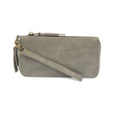 Cool, stylish, and organized, too! This grey wallet has it all! 12 credit card pockets, 2 change pockets and 2 billfold pockets all wrapped in a dark oak&nbsp;colored vegan leather, lined with rugged washed canvas, and accented with our new Logo zipper pull. The removable strap lets you carry it as a compact wristlet, too!


Dimensions: 7.75 in. W x 4 in. H x .5 in. D
Full Zip Around Closure
Exterior Zip Pocket on Spine
Removable Wristlet Strap
12 Credit Card Pockets
2 Billfold Pockets
Interior Zipper
Coin 
