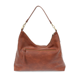 This oversized, slouchy, cool hobo bag is made of tumbled buffalo grain cinnamon-colored vegan leather, which gives it that casual boho chic look! With two included removable shoulder straps, you can wear it as a short shoulder bag or a crossbody bag.