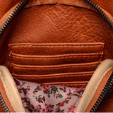 Stay organized on the go with this versatile medium-sized cognac sling bag featuring a modern silhouette and practical storage. Designed to blend fashion with functionality, it features spacious zip compartments, lightweight construction, and an ergonomic crossbody fit with an adjustable strap. Roomy enough to stow a large wallet, cell phone, even a slim water bottle. The Jas is ideal for city walks, sightseeing, and weekend adventures.
Product Details
Dimensions: 511 in. H x 6.25 in. W x 3 in. D
Removable 