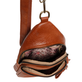 Stay organized on the go with this versatile medium-sized cognac sling bag featuring a modern silhouette and practical storage. Designed to blend fashion with functionality, it features spacious zip compartments, lightweight construction, and an ergonomic crossbody fit with an adjustable strap. Roomy enough to stow a large wallet, cell phone, even a slim water bottle. The Jas is ideal for city walks, sightseeing, and weekend adventures.
Product Details
Dimensions: 511 in. H x 6.25 in. W x 3 in. D
Removable 