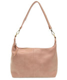 The Danna crossbody is masterfully crafted in our gorgeous new tumbled gloss vegan  blush leather to give your look a polished yet casual vibe. Fitted with a top zip closure accented by our signature logo zip pull and two removable and interchangeable shoulder straps; a short shoulder strap to wear snug to the body or a long adjustable, removable crossbody shoulder strap to wear as a crossbody, this slouchy hobo design is perfect for your everyday style.


Dimensions: 9.5 in. H X 10.5 in. W X 3.5 in