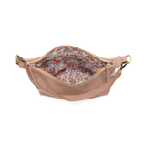 The Danna crossbody is masterfully crafted in our gorgeous new tumbled gloss vegan blush leather to give your look a polished yet casual vibe. Fitted with a top zip closure accented by our signature logo zip pull and two removable and interchangeable shoulder straps; a short shoulder strap to wear snug to the body or a long adjustable, removable crossbody shoulder strap to wear as a crossbody, this slouchy hobo design is perfect for your everyday style.


Dimensions: 9.5 in. H X 10.5 in. W X 3.5 in