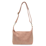 The Danna crossbody is masterfully crafted in our gorgeous new tumbled gloss vegan blush leather to give your look a polished yet casual vibe. Fitted with a top zip closure accented by our signature logo zip pull and two removable and interchangeable shoulder straps; a short shoulder strap to wear snug to the body or a long adjustable, removable crossbody shoulder strap to wear as a crossbody, this slouchy hobo design is perfect for your everyday style.


Dimensions: 9.5 in. H X 10.5 in. W X 3.5 in