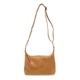The Danna crossbody is masterfully crafted in our gorgeous new tumbled gloss vegan camel leather to give your look a polished yet casual vibe. Fitted with a top zip closure accented by our signature logo zip pull and two removable and interchangeable shoulder straps; a short shoulder strap to wear snug to the body or a long adjustable, removable crossbody shoulder strap to wear as a crossbody, this slouchy hobo design is perfect for your everyday style.


Dimensions: 9.5 in. H X 10.5 in. W X 3.5 in. D
Top z