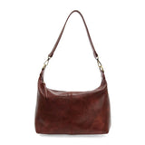 The Danna crossbody is masterfully crafted in our gorgeous new tumbled gloss vegan spicy red leather to give your look a polished yet casual vibe. Fitted with a top zip closure accented by our signature logo zip pull and two removable and interchangeable shoulder straps; a short shoulder strap to wear snug to the body or a long adjustable, removable crossbody shoulder strap to wear as a crossbody, this slouchy hobo design is perfect for your everyday style.


Dimensions: 9.5 in. H X 10.5 in. W X 3.5 in. D
T