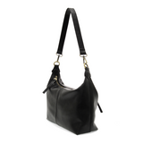 The Danna crossbody is masterfully crafted in our gorgeous new tumbled gloss vegan black leather to give your look a polished yet casual vibe. Fitted with a top zip closure accented by our signature logo zip pull and two removable and interchangeable shoulder straps; a short shoulder strap to wear snug to the body or a long adjustable, removable crossbody shoulder strap to wear as a crossbody, this slouchy hobo design is perfect for your everyday style.


Dimensions: 9.5 in. H X 10.5 in. W X 3.5 in. D
Top z