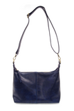 The Danna crossbody is masterfully crafted in our gorgeous new tumbled gloss vegan navy leather to give your look a polished yet casual vibe. Fitted with a top zip closure accented by our signature logo zip pull and two removable and interchangeable shoulder straps; a short shoulder strap to wear snug to the body or a long adjustable, removable crossbody shoulder strap to wear as a crossbody, this slouchy hobo design is perfect for your everyday style.


Dimensions: 9.5 in. H X 10.5 in. W X 3.5 in. D
Top zi