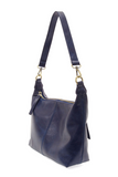 The Danna crossbody is masterfully crafted in our gorgeous new tumbled gloss vegan navy leather to give your look a polished yet casual vibe. Fitted with a top zip closure accented by our signature logo zip pull and two removable and interchangeable shoulder straps; a short shoulder strap to wear snug to the body or a long adjustable, removable crossbody shoulder strap to wear as a crossbody, this slouchy hobo design is perfect for your everyday style.


Dimensions: 9.5 in. H X 10.5 in. W X 3.5 in. D
Top zi