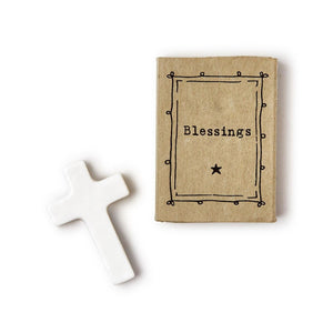 One of our most popular items in the store, our tiny white "blessings" cross, comes with its own box, making it easy to give!  Cross: 7/8" W x 1/4" D x 1 3/8" H  Gift box: 1 3/8" W x 7/8" D x 1 7/8" H