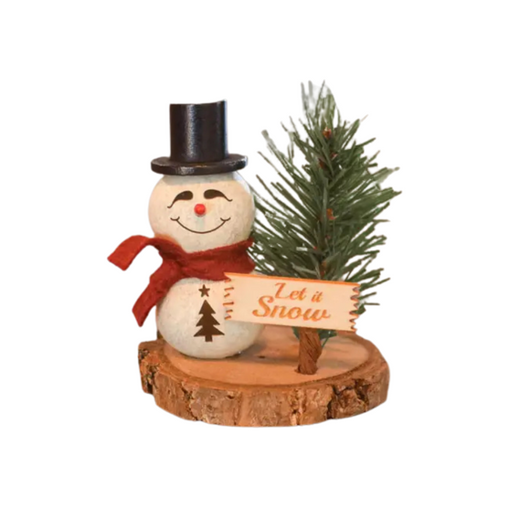 This little Easton snowman gourd sits on a wooden biscuit base with a wooden sign saying, 