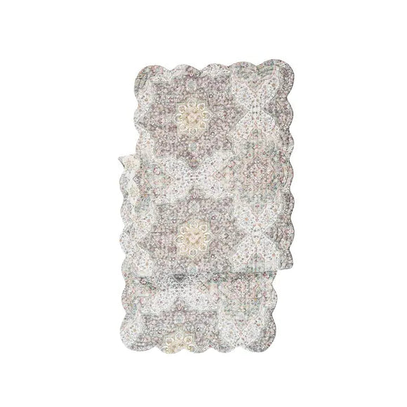 This beautiful quilted runner will bring happiness to your home and features a traditional medallion design in a modern grey color palette with hints of purple, pink, gold, blue, mint and olive green It will easily bring a pop of color to any table. It will easily brighten any tables. Finished with a scalloped edge, this tabletop collection is crafted of 100% cotton and hand-guided machine quilting.

Machine wash cold and tumble dry low for easy care.

14