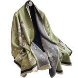 This Equestrian Green/Black Bouquet Reversible Wrap is not just an accessory—it's a versatile statement piece that elevates your look effortlessly! Crafted with exquisite artisan details, this shawl features vibrant colors that brighten any outfit while providing warmth and comfort. Whether you're dressing up for a night out or adding flair to your everyday routine, this wrap adapts to every occasion.

Flaunt your unique style while staying cozy and chic. You deserve it!

This one-size-fits-all reversible w