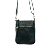 This evergreen colored compact phone bag is designed for everyday convenience and hands-free style. This slim crossbody is made from softly tumbled vegan leather with a sleek silhouette, adjustable crossbody strap and a secure zip closure. The Lia features a front zip pocket and a back slide pocket to keep your phone, cards, keys and small essentials neatly organized and easy to access. This crossbody bag is perfect for travel, shopping, concerts or daily errands.
Product Details
Dimensions: 7.5 in. H x 6.2