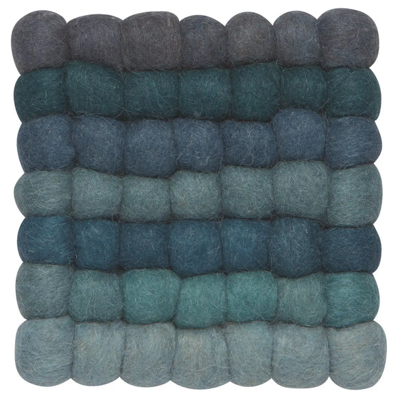 Ombre colors create a kaleidoscope pattern on these cozy woolen trivets. Each sphere is hand-felted and connected creating an unusual, textural statement for the kitchen or table.

6