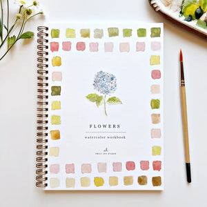 We are obsessed with this Flower Watercolor Workbook! It includes 12 floral illustrations with an example of the finished painting, step-by-step instructions, and a lightly illustrated sketch for you to paint. It's just like a coloring book, but with watercolor! Enjoy this peaceful painting hobby on your own, with children, or with friends. Makes a wonderful gift and is perfect for artists of any age.

12 beginner-friendly illustrations on thick 120lb watercolor paper

Lay-flat pages with spiral binding for