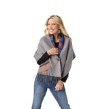 This women’s reversible wrap offers multiple styling options with a versatile design that can be worn on either side for two distinct looks. The button front closure adds structure while allowing for adjustable draping, and the fringe detailing brings movement and texture. Crafted from a soft woven fabric, this layering wrap combines comfort with standout pattern, making it an easy choice for both casual outfits and more styled looks.

Materials: Acrylic/Cotton.