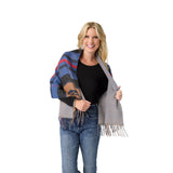 This women’s reversible wrap offers multiple styling options with a versatile design that can be worn on either side for two distinct looks. The button front closure adds structure while allowing for adjustable draping, and the fringe detailing brings movement and texture. Crafted from a soft woven fabric, this layering wrap combines comfort with standout pattern, making it an easy choice for both casual outfits and more styled looks.

Materials: Acrylic/Cotton.