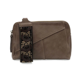 Retro styling crafted in antiqued vegan leather gives this taupe clutch a vintage vibe. The removable woven wrist strap is the finishing touch on this stylish bag so you can wear it as a wristlet, a clutch, or a crossbody with the included removable shoulder strap!





6.75"H x 9.75"W x 2.25"D

Removable and adjustable crossbody strap 22"-26"

Removable long wristlet strap 7.5" long

Zippered top closure

Interior zippered pocket

Exterior back zipper pocket

Brass plated hardware

100% vegan leather (poly
