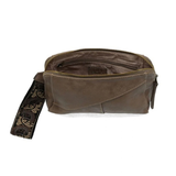 Retro styling crafted in antiqued vegan leather gives this taupe clutch a vintage vibe. The removable woven wrist strap is the finishing touch on this stylish bag so you can wear it as a wristlet, a clutch, or a crossbody with the included removable shoulder strap!





6.75"H x 9.75"W x 2.25"D

Removable and adjustable crossbody strap 22"-26"

Removable long wristlet strap 7.5" long

Zippered top closure

Interior zippered pocket

Exterior back zipper pocket

Brass plated hardware

100% vegan leather (poly