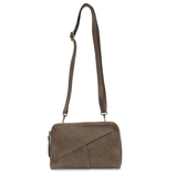 Retro styling crafted in antiqued vegan leather gives this taupe clutch a vintage vibe. The removable woven wrist strap is the finishing touch on this stylish bag so you can wear it as a wristlet, a clutch, or a crossbody with the included removable shoulder strap!





6.75"H x 9.75"W x 2.25"D

Removable and adjustable crossbody strap 22"-26"

Removable long wristlet strap 7.5" long

Zippered top closure

Interior zippered pocket

Exterior back zipper pocket

Brass plated hardware

100% vegan leather (poly