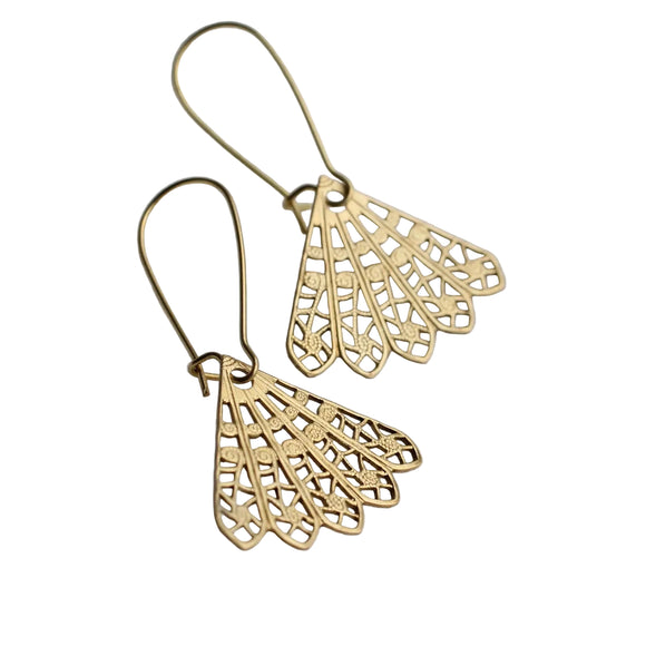 These intricate and beautiful earrings feature a bohemian filigree design in solid brass, which has an aged finish with touches of deep gold. The beautiful, intricate detail reminds us of vintage lace and hangs about an inch below the earlobe. 

The earrings measure just over an inch and a quarter in length and have gold plated brass earwires.