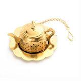 This golden stainless steel teapot-shaped tea infuser is perfect for loose-leaf tea lovers! Made from durable 304 food-grade stainless steel, it’s rust-proof and easy to clean, even dishwasher-safe. The set includes a drip tray and an adorable teapot-shaped infuser. IT makes an excellent gift for tea enthusiasts.

Approximate size: 2.4" dia. (drip tray) x 1.1"H