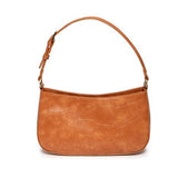 The sleek golden tan Erin Hobo will compliment your look for the office or your next night out. Fashioned in glossy croc embossed vegan leather, this sophisticated bag closes with a brass zipper to keep your belongings secure and is accented with burnished brass rings that open to allow you to change the shoulder straps. Two shoulder straps are included with this stylish Hobo, a short strap to carry close to the body or a long strap to carry as a shoulder bag or as a crossbody. Both straps are adjustable an