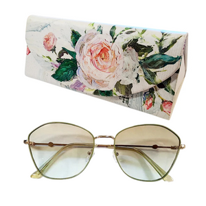 These frames feature gradient green lenses that provide both style and sun protection. The accompanying collapsible floral printed case adds a touch of convenience and charm. Whether lounging on the beach or strolling through the city, these sunglasses are the perfect way to add color and style to your look.
It comes with a coordinating triangle-shaped case with a floral design
Gradient Lens
100% UV protection


sunglasses: 5 1/2"W x 2"L x 1"H


case: 6 1/2" W x 3" L x 2" H