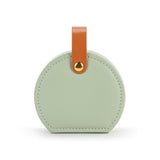 A beautiful gift for yourself or a friend, this traveling jewelry case is green with a brown strap closure. Inside there is room for your jewelry for a short weekend or a couple of weeks!

Foam, metal, paper, polyester fiber, polyurethane

2.5" h x 4.5" w x 4.5" d