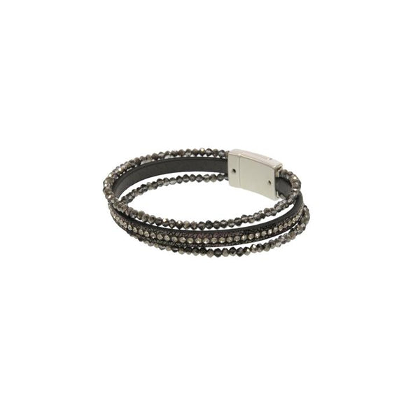You'll love how easy it is to put this magnetic clasp bracelet on and take off!  This bracelet has two glitzy grey beaded strands on either side of a grey leather band with a sparkly strand in the center of it.

Approximately 1/2
