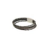 You'll love how easy it is to put this magnetic clasp bracelet on and take off!&nbsp; This bracelet has two glitzy grey beaded strands on either side of a grey leather band with a sparkly strand in the center of it.

Approximately 1/2" W x&nbsp; 7.75" L