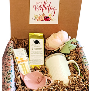 If she LOVES tea, send her a tea box today! Our Birthday Tea Box has our popular Basket Weave Tea Infuser Mug with a grey silicone lid that she'll be able to brew our&nbsp; Strawberry Raspberry (black) tea in. We've also included a&nbsp;Pink Teapot Bag/Spoon Holder and some Honey Sticks.&nbsp; She'll love the Pretty Silk Peony Stem to put in her favorite vase. All of this is packed in crinkle and wrapped up in a pink, green, blue and white floral patterned tissue and tied in a bow.&nbsp; If you'd like us to