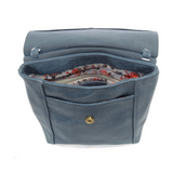 With a slim, streamlined look, this vegan leather crossbody in a beautiful chambray blue color features a top flap with magnetic snap closure and an adjustable shoulder strap so you can carry it as a crossbody or a shoulder bag. With two convenient slip pockets, one under the flap and one on the back you can keep your phone and keys in easy reach.


Dimensions: 9.5 in. H x 8 in. W x 2.75 in. D
Magnetic snap closure
Adjustable shoulder strap: 14 in. - 27.5 in. drop
Brass plated hardware
100% Vegan leather (p