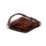The sleek pecan Erin Hobo will compliment your look for the office or your next night out. Fashioned in glossy croc embossed vegan leather, this sophisticated bag closes with a brass zipper to keep your belongings secure and is accented with burnished brass rings that open to allow you to change the shoulder straps. Two shoulder straps are included with this stylish Hobo, a short strap to carry close to the body or a long strap to carry as a shoulder bag or as a crossbody. Both straps are adjustable and rem