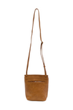 With a slim, streamlined look, this vegan leather crossbody in a beautiful chestnut color features a top flap with magnetic snap closure and an adjustable shoulder strap so you can carry it as a crossbody or a shoulder bag. With two convenient slip pockets, one under the flap and one on the back you can keep your phone and keys in easy reach.


Dimensions: 9.5 in. H x 8 in. W x 2.75 in. D
Magnetic snap closure
Adjustable shoulder strap: 14 in. - 27.5 in. drop
Brass plated hardware
100% Vegan leather (polyur