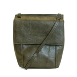 With a slim, streamlined look, this vegan leather crossbody, in a beautiful backwoods green, features a top flap with magnetic snap closure and an adjustable shoulder strap so you can carry it as a crossbody or a shoulder bag. With two convenient slip pockets, one under the flap and one on the back you can keep your phone and keys in easy reach.


Dimensions: 9.5 in. H x 8 in. W x 2.75 in. D
Magnetic snap closure
Adjustable shoulder strap: 14 in. - 27.5 in. drop
Brass plated hardware
100% Vegan leather (pol