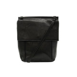 With a slim, streamlined look, this vegan leather crossbody in a beautiful cinnamon black features a top flap with magnetic snap closure and an adjustable shoulder strap so you can carry it as a crossbody or a shoulder bag. With two convenient slip pockets, one under the flap and one on the back you can keep your phone and keys in easy reach.


Dimensions: 9.5 in. H x 8 in. W x 2.75 in. D
Magnetic snap closure
Adjustable shoulder strap: 14 in. - 27.5 in. drop
Brass plated hardware
100% Vegan leather (polyur