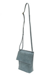 With a slim, streamlined look, this vegan leather crossbody in a beautiful chambray blue color features a top flap with magnetic snap closure and an adjustable shoulder strap so you can carry it as a crossbody or a shoulder bag. With two convenient slip pockets, one under the flap and one on the back you can keep your phone and keys in easy reach.


Dimensions: 9.5 in. H x 8 in. W x 2.75 in. D
Magnetic snap closure
Adjustable shoulder strap: 14 in. - 27.5 in. drop
Brass plated hardware
100% Vegan leather (p